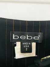 Load image into Gallery viewer, Bebe Women’s Pinstripe Asymmetrical Skirt | 2 UK6 | Black
